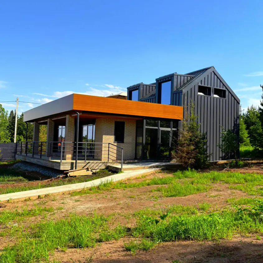 Фото 4 Металлосайдинг Евро-Брус под брус цвет Тик Printech и RAL7024 Серый Графит на фасаде дома